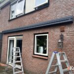 knikarmscherm corfu met geel zwart doek in denekamp