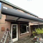 knikarmscherm ibiza plus in antracietgrijze kleur in hengelo